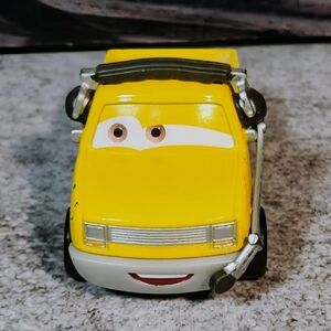 Disney / Pixar Cars 2 • Beloved John Lassetire • Mattel • Yellow Pickup Truck